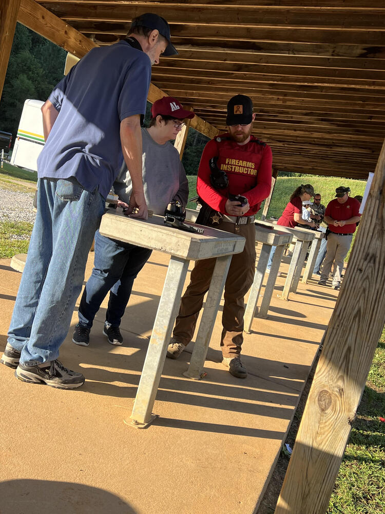 Citizens taking firearms safety class