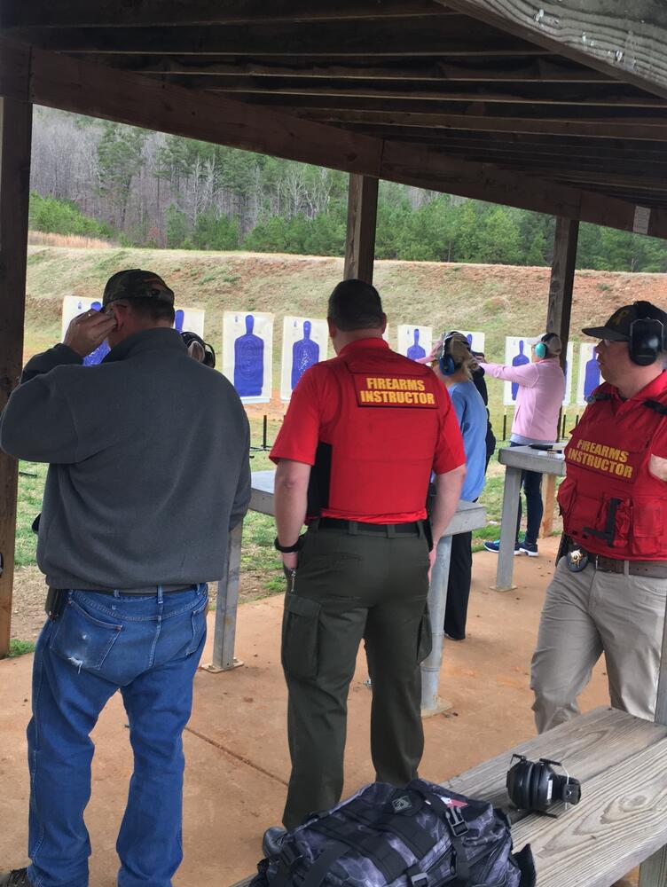 Citizens taking firearms safety class
