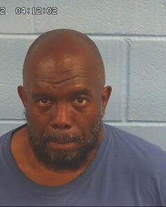 Mugshot of EL, AHMMOSE