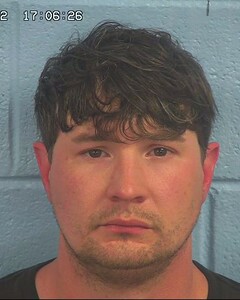 Mugshot of PEEK, ADAM