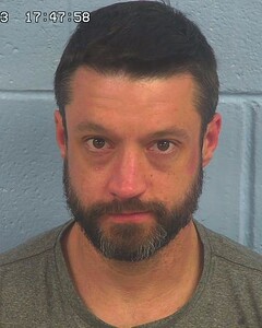 Mugshot of FROST, JASON