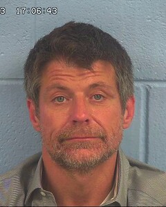 Mugshot of MOORE, JASON